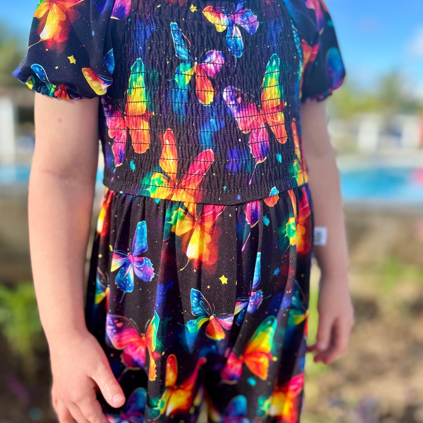 Whimsical Wings Smocked Romper